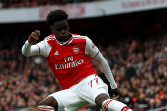 Bukayo Saka in action during a Premier League match