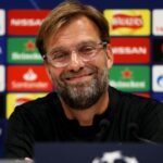 Jurgen Klopp at a press conference or speaking with players